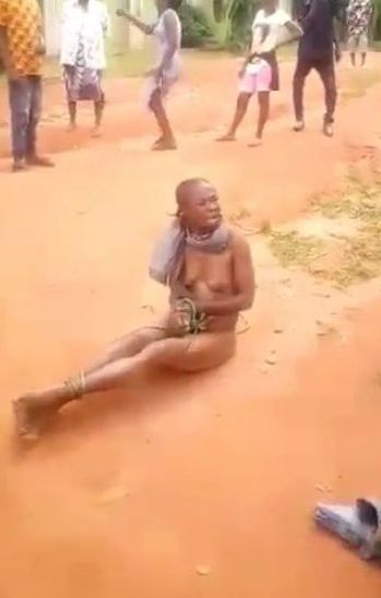 Nigerian Girl With Nice Breasts Stripped Naked In Public And Tied For Stealing (18+)