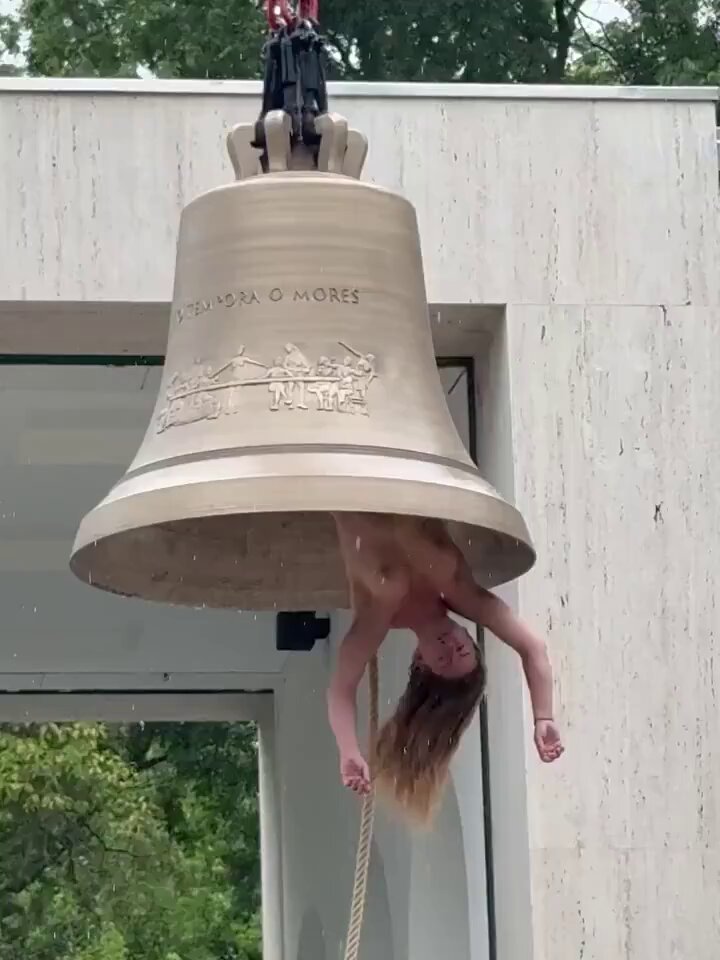 Naked Austrian Woman Hangs Inside Bell (18+)